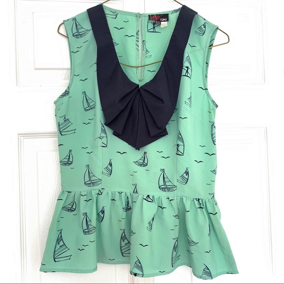 Yumi Peplum Sleeveless Blouse - Picture 3 of 5